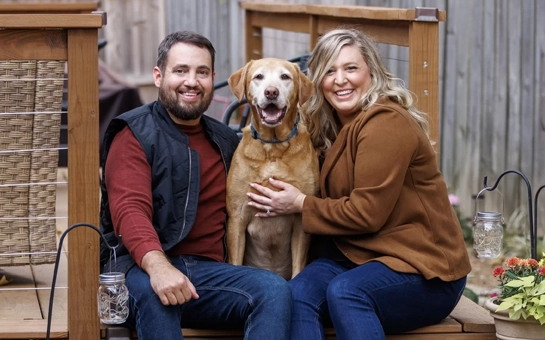Chiropractor Nashville TN Greg Beauchamp With Family HP Dr. Greg Beauchamp with his wife and dog.